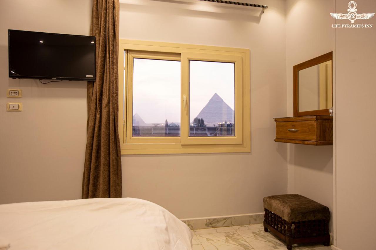 Life Pyramids Inn Kafret el-Gabal Exterior foto