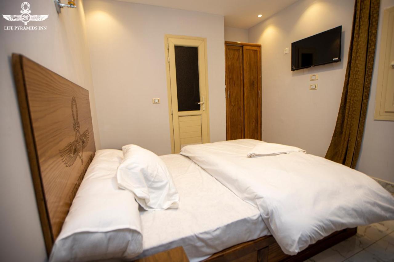 Life Pyramids Inn Kafret el-Gabal Exterior foto